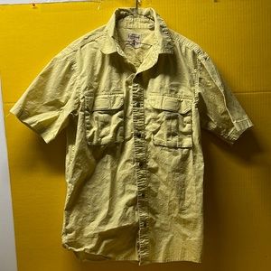 Redhead yellow short sleeve button down collared shirt. Mens size medium